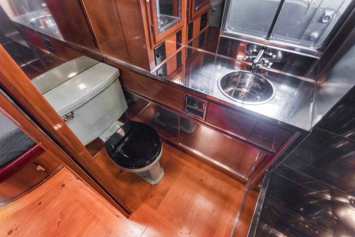 Bathroom with jade toilet and stainless surfaces